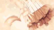 a close up of a person 's hand holding a fan in a video game .