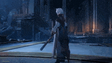 a video game character is holding a sword in a room