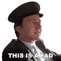 a man wearing a suit and hat says " this is a fad "