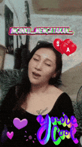 a woman with a tattoo on her chest is surrounded by hearts and the word love