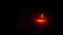 a close up of a shadow the hedgehog in a dark room with a red light behind him .