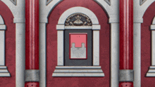 a red and white building with arches and a door that says e