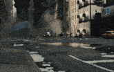 a yellow car is parked on the side of the road in a city