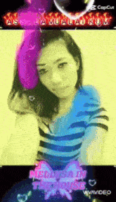 a woman in a blue and purple striped shirt with the words assalamualaikum on the top
