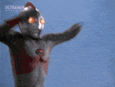 a cartoon character with the word ultraman on the top