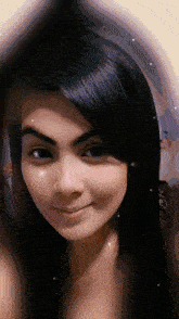 a close up of a woman 's face with black hair
