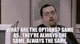 a man with glasses and a beard is sitting in front of a computer with the words what are the options ? same as .