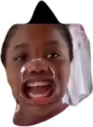 a close up of a child 's face with a bubble in his mouth