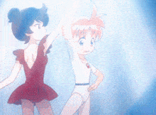 a girl in a red dress and a boy in white are dancing together