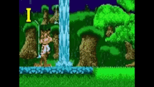 a video game with a waterfall and a letter i