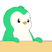 a green and white penguin with a yellow beak is sitting on a table