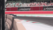 a race track with a prorata ad on the side