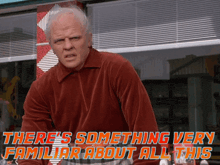 a man in a red velvet shirt says there 's something very familiar about all this