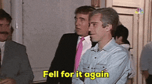 a group of men are standing in a room and one of them is saying fell for it again