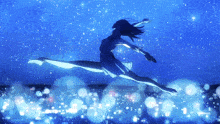 a woman is jumping in the air with a blue background