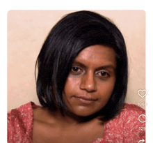 a close up of a woman 's face with a heart next to her