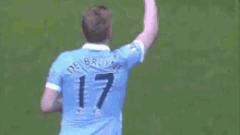 a soccer player with the number 17 on his jersey