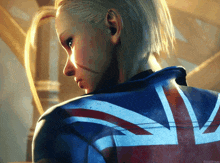 a woman wearing a jacket with a british flag on the back
