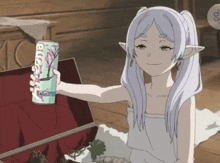 a girl with white hair is holding a can of evian