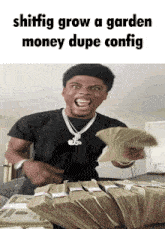 a man in a black shirt is holding stacks of money