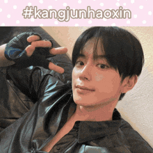 a picture of a young man with the hashtag #kangjunhaoxin above him