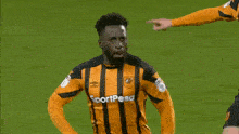 a soccer player wearing a jersey with the number 10 on it