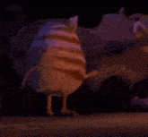 a cartoon cat is standing in front of a guitar .