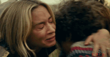 hug emily blunt evelyn abbott a quiet place part ii come here