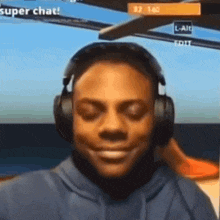 a man wearing headphones is smiling in a video game .