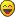 a pixel art of a smiley face with a big smile on its face .