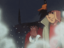 a couple of men standing under an umbrella in the snow