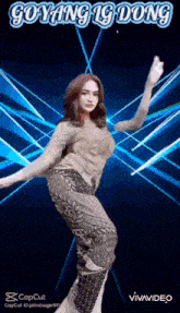 a woman is dancing in front of a blue background with the words goyang 19 dong on it