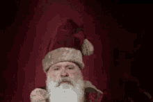 Santa'S Weird Creepy Cap GIF - Hat Creepy Santa Santa Claus GIFs