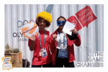 two youth olympic games game changers are posing for a picture