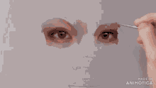 a close up of a person 's face with the words made in animatica on the bottom