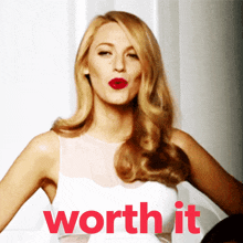 a woman in a white dress with the word worth it in red