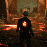 a man in a black jacket with a heart on the back