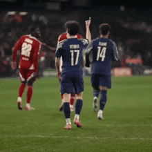 a soccer player with the number 17 on the back of his shirt