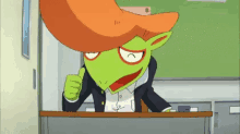 a cartoon character is sitting at a desk with his fist up
