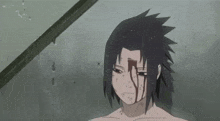 a naked cartoon character with blood on his face is standing in the rain .
