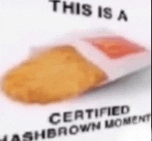 a mcdonald 's chicken nugget is sitting on top of a white surface .