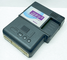 a mcd3 multi game doctor ii device is sitting on a table