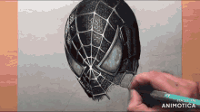 a person is drawing a spider man helmet with a pencil