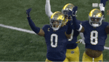three football players wearing jerseys with the numbers 29 0 and 8