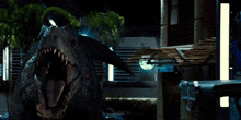 a dinosaur is standing in front of a building with a sign that says t. rex