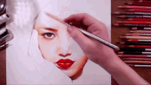a person drawing a woman 's face with prismacolor pencils