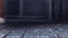 a person wearing a pair of red shoes is walking on a metal grid