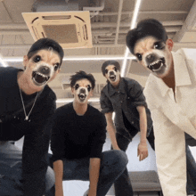 a group of men wearing masks that look like dogs