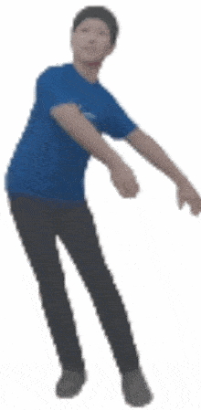 a man in a blue shirt and black pants is standing with his arms outstretched
