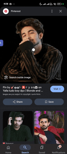 a screenshot of pinterest shows a picture of a man with a beard